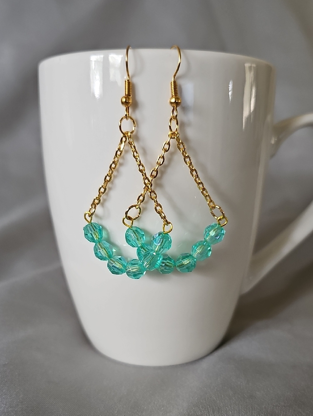 Gold Tone Teal Bead Dangle Earrings